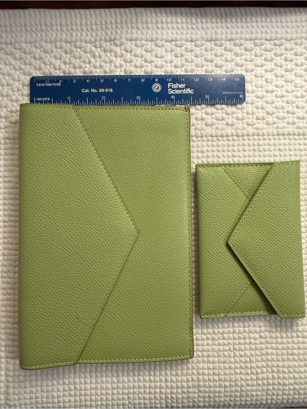 Set of 2 Dooney and Bourke Apple green leather envelopes. Gently used.